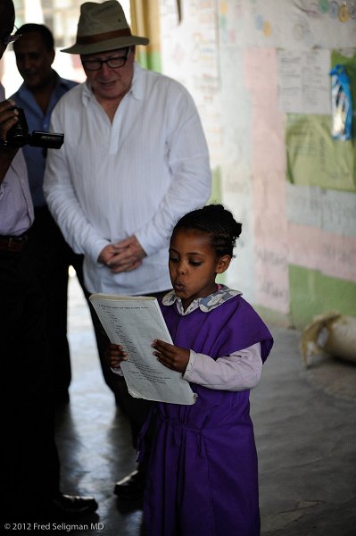 20120327_102705 Nikon D3S (1) 2x3.jpg - Reading a story in Amharic